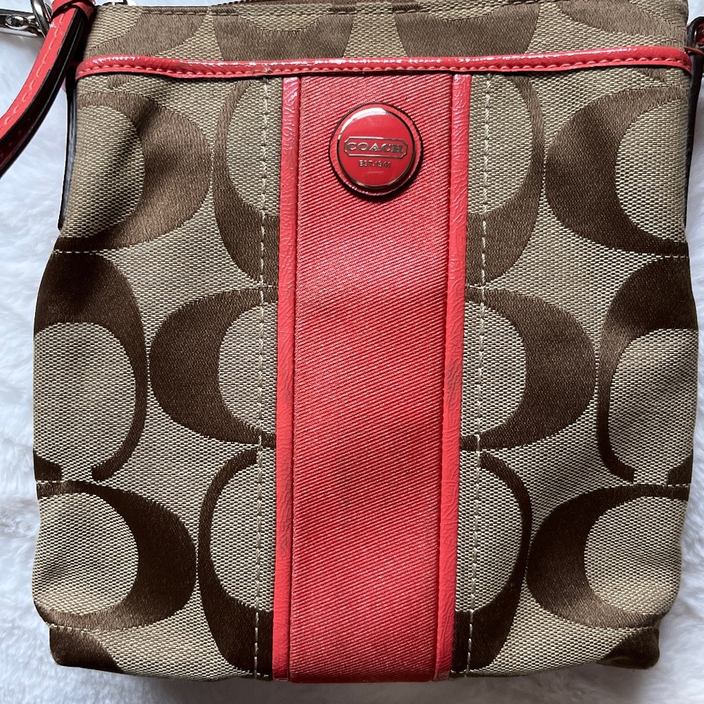 Signature Coach Crossbody with Coral stripe